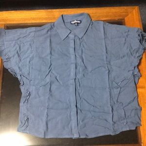 Blue shirt with ruffled sleeves